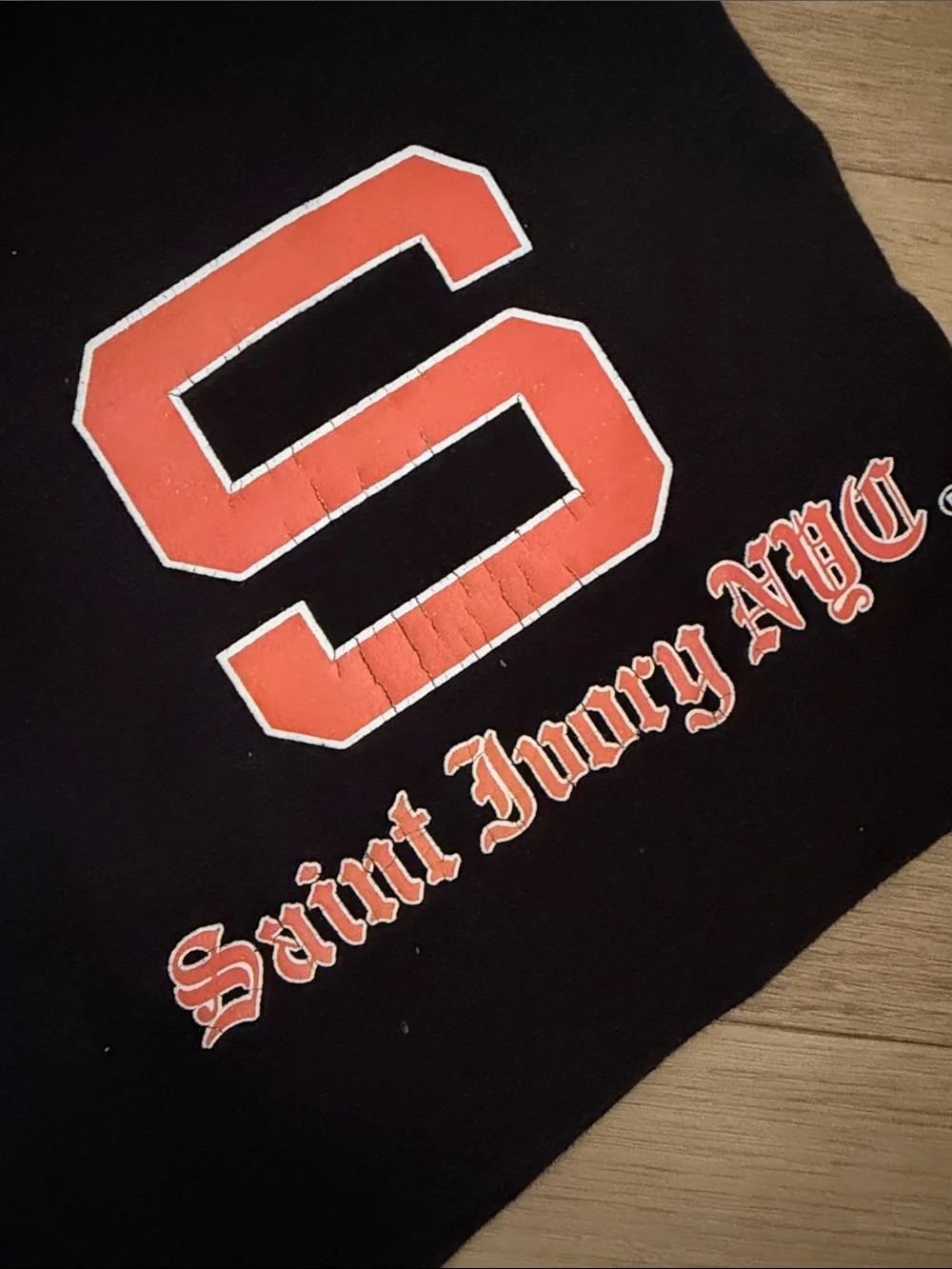 Black Athletic Shorts with Red 'S' Graphic